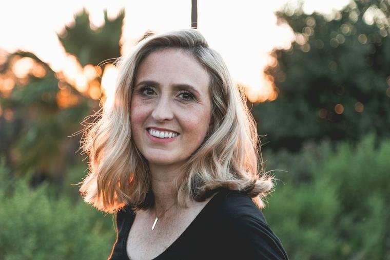 Woman smiling in golden hour light